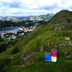 Scenic view of mountains against cloudy sky