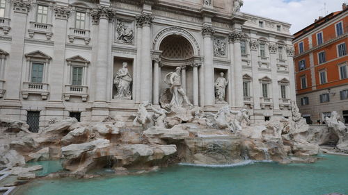 Fountain in front of historic building