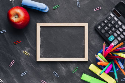 Directly above shot of office supplies on table