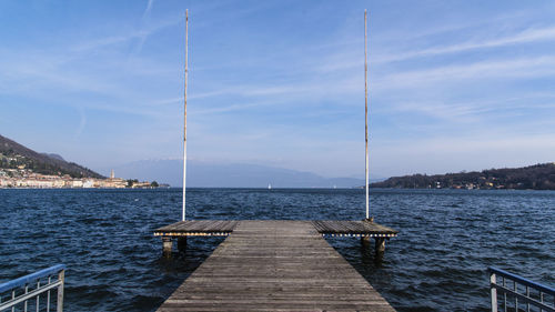 Pier over sea against sky