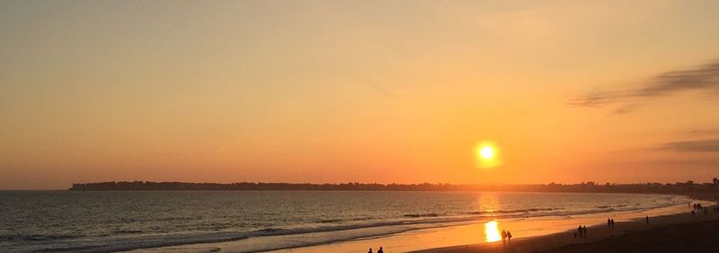 Scenic view of sea at sunset