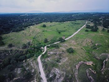 High angle view of road amidst landscape against sky