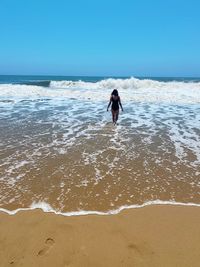 Walking into the waves