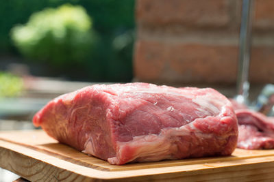 Close-up of meat on cutting board