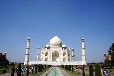 View of temple against clear blue sky