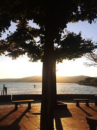 Scenic view of sea against sky at sunset