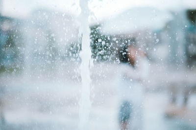 Full frame shot of wet glass window during rainy season