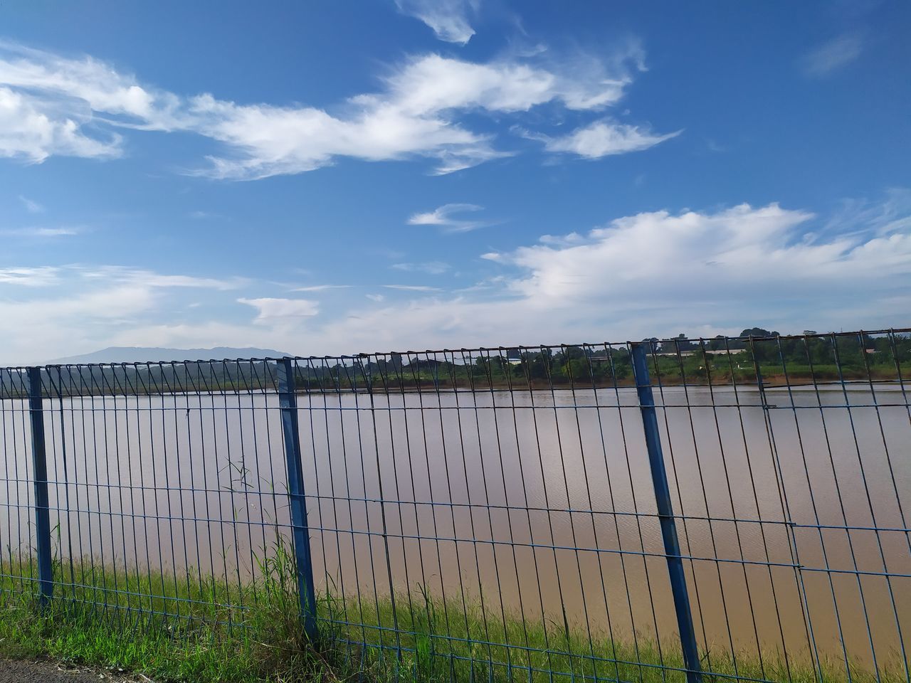 FENCE AGAINST CLEAR SKY