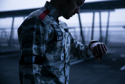 Man checking time on wristwatch