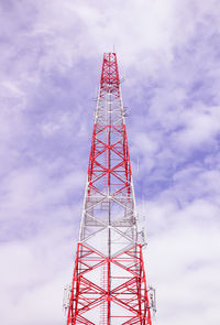 Low angle view of communications tower against sky