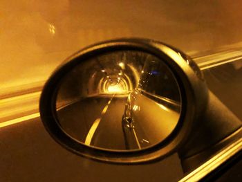 Close-up of side-view mirror of car