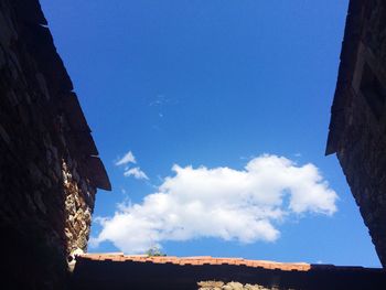 Low angle view of built structure against blue sky