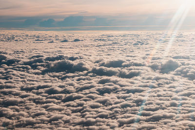 Aerial view of cloudscape against sky during sunset