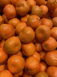 Full frame shot of oranges at market stall