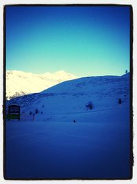 Scenic view of mountains against clear sky