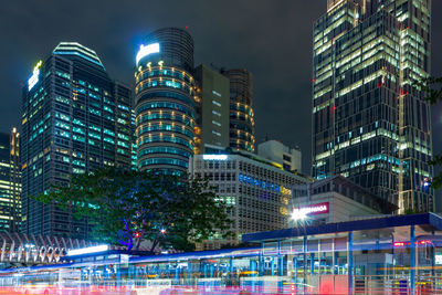 Illuminated buildings in city at night in jakarta 