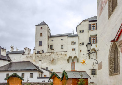 Low angle view of buildings against sky
