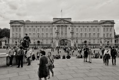 Group of people in front of historical building