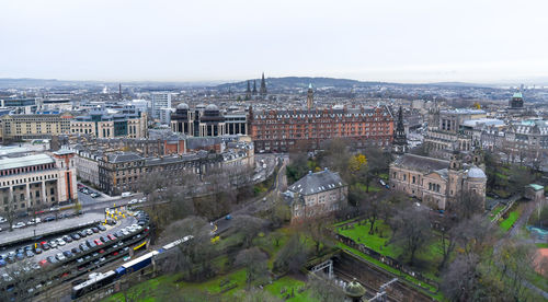 High angle view of buildings in city against sky