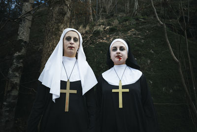 Two women dressed as nuns for halloween