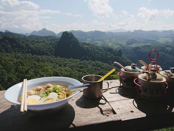 Food on table against mountains