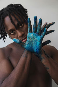 Portrait of shirtless young man