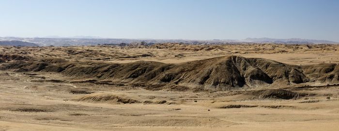 Scenic view of desert against sky