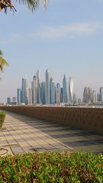 Modern buildings in city against sky