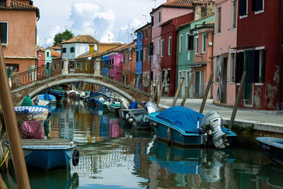 Arch bridge over canal at burano island italy in venetian lagoon