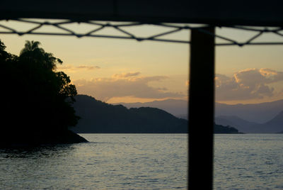 Scenic view of sea at sunset