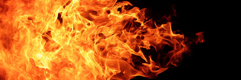 Close-up of fire against black background