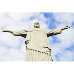 Low angle view of church against cloudy sky