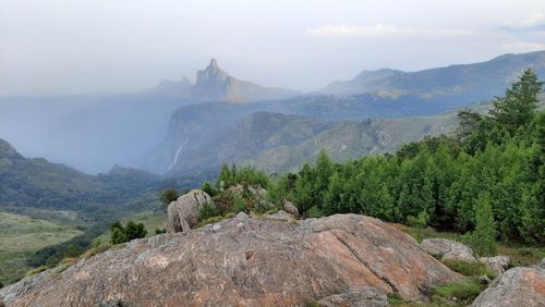 Beautiful scenic view from kodanad view point ooty of misty rain cloud hill mountain green forest