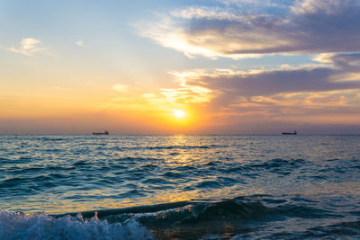 Scenic view of sea against sky during sunset