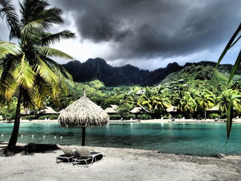 Scenic view of sea against cloudy sky