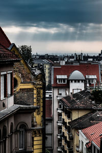 High angle view of buildings in city against sky