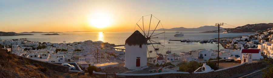 Panoramic view of beach against sky during sunset