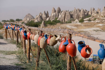 Coloured pots on fence in cappadocia