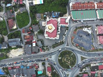 High angle view of traffic on road by buildings