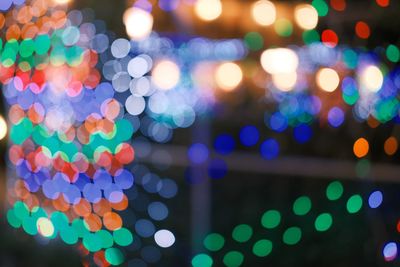 Defocused image of illuminated lights at night