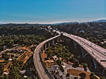 High angle view of bridge in city against sky