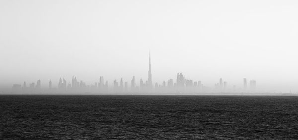 View of buildings in city against sky