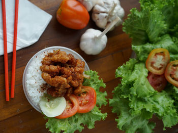 High angle view of vegetables in plate on table