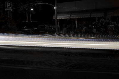 Light trails on street in city at night