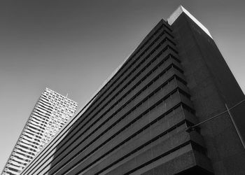 Low angle view of modern building against clear sky
