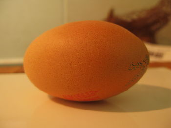 Close-up of orange juice on table