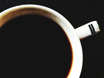 Directly above shot of coffee cup on table