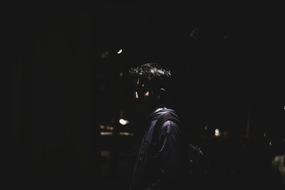 Close-up of illuminated stage in darkroom