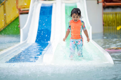 Full length of girl in swimming pool