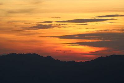 Scenic view of dramatic sky during sunset